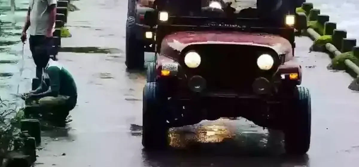 Classic Mahindra Thar from the Drive Easy fleet on a wet Goa road after the monsoon